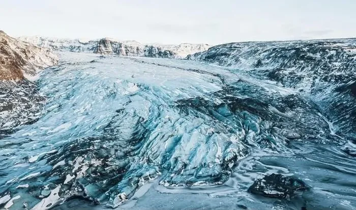 Framed Print : Aerial drone top view glacier iceland Sólheimajökull, Melting Ice, Climate Change and Global Warming Concept Framed Print : Aerial drone top view glacier iceland Sólheimajökull, Melting Ice, Climate Change and Global Warming Concept