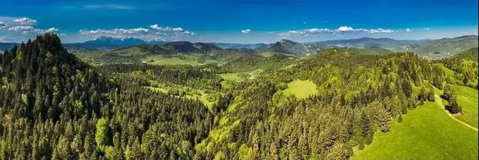 Framed Print : Aerial drone view over green hills of Pieniny National Park and snowy Tatra Mountains Framed Print : Aerial drone view over green hills of Pieniny National Park and snowy Tatra Mountains