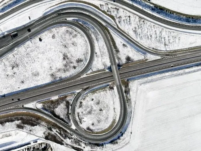 Framed Print : aerial drone view of a highway interchange, winter landscape Framed Print : aerial drone view of a highway interchange, winter landscape