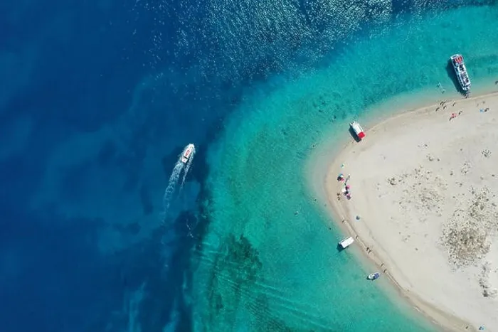 Framed Print : Aerial drone view of iconic small uninhabited island of Marathonisi featuring clear water, sandy shore and natural hatchery of Caretta-Caretta sea tur