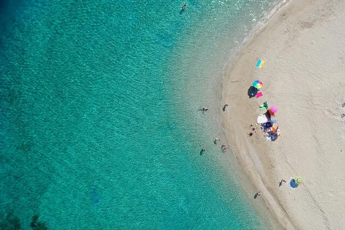 Framed Print : Aerial drone view of iconic small uninhabited island of Marathonisi featuring clear water, sandy shore and natural hatchery of Caretta-Caretta sea tur
