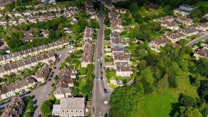 Framed Print : Aerial drone view looking up Newbridge Hill, heading out of the City of Bath, UK. (22-08-2023) Framed Print : Aerial drone view looking up Newbridge Hill, heading out of the City of Bath, UK. (22-08-2023)