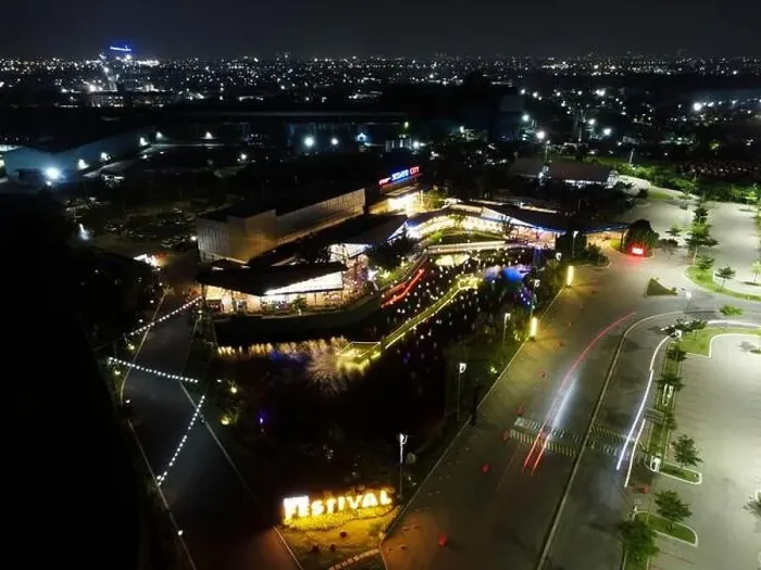 Framed Print : Aerial drone view of modern building in Jakarta central business district at night with Jakarta cityscape Framed Print : Aerial drone view of modern building in Jakarta central business district at night with Jakarta cityscape