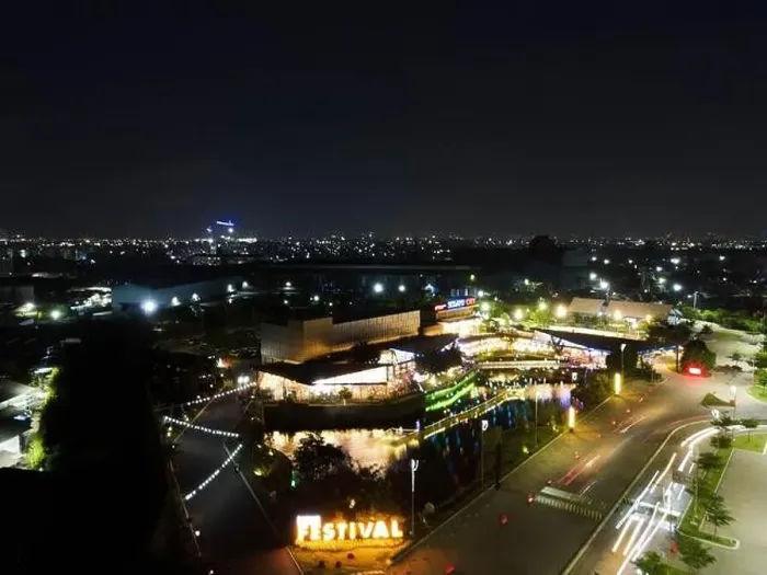 Framed Print : Aerial drone view of modern building in Jakarta central business district at night with Jakarta cityscape Framed Print : Aerial drone view of modern building in Jakarta central business district at night with Jakarta cityscape