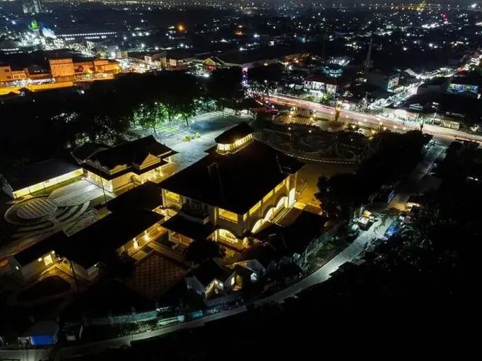 Framed Print : Aerial drone view of Monument Gedung Juang is one of historical building in Tambun at night Framed Print : Aerial drone view of Monument Gedung Juang is one of historical building in Tambun at night