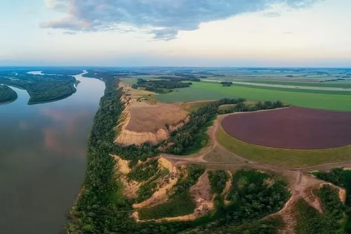 Framed Print : Aerial drone view of river landscape in sunny summer evening Framed Print : Aerial drone view of river landscape in sunny summer evening