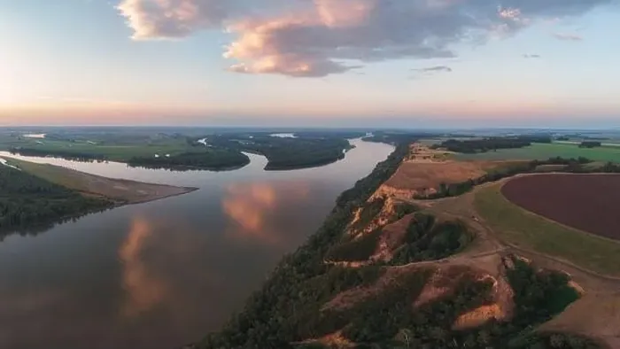 Framed Print : Aerial drone view of river landscape in sunny summer evening Framed Print : Aerial drone view of river landscape in sunny summer evening