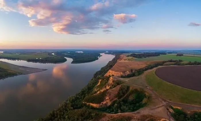 Framed Print : Aerial drone view of river landscape in sunny summer evening Framed Print : Aerial drone view of river landscape in sunny summer evening