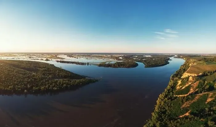Framed Print : Aerial drone view of river landscape in sunny summer evening Framed Print : Aerial drone view of river landscape in sunny summer evening