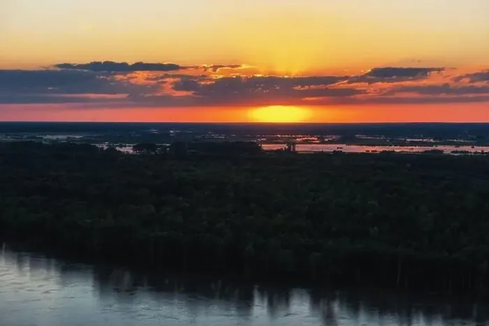 Framed Print : Aerial drone view of river landscape in sunny summer sunset Framed Print : Aerial drone view of river landscape in sunny summer sunset