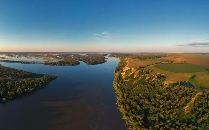 Framed Print : Aerial drone view of river landscape in sunny summer sunset