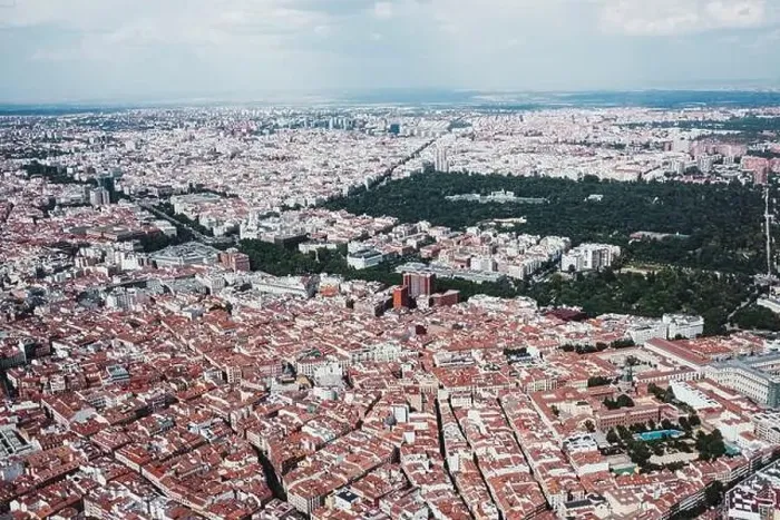 Framed Print : From above aerial drone view shot of city with dense infrastructure Framed Print : From above aerial drone view shot of city with dense infrastructure
