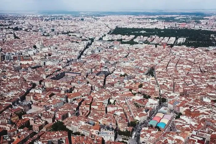 Framed Print : From above aerial drone view shot of city with dense infrastructure Framed Print : From above aerial drone view shot of city with dense infrastructure