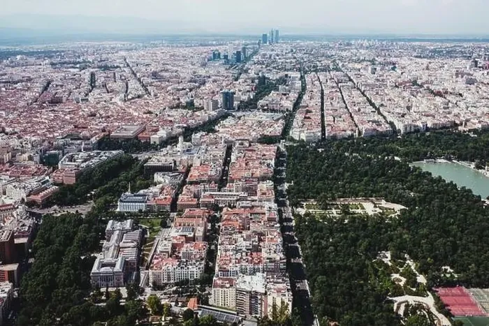 Framed Print : From above aerial drone view shot of city with dense infrastructure Framed Print : From above aerial drone view shot of city with dense infrastructure