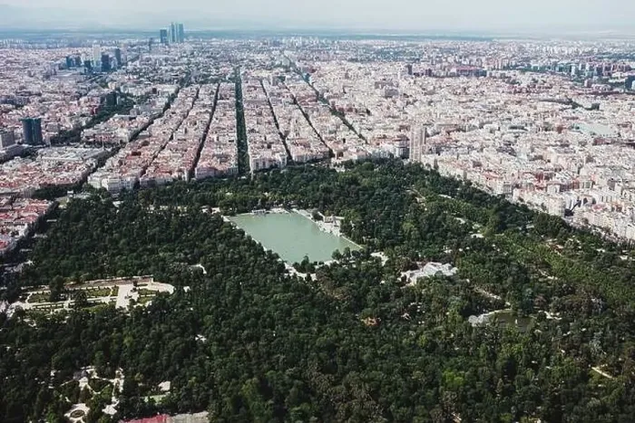 Framed Print : From above aerial drone view shot of city with dense infrastructure with lake and park in El Retiro in Madrid, Spain Framed Print : From above aerial drone view shot of city with dense infrastructure with lake and park in El Retiro in Madrid, Spain