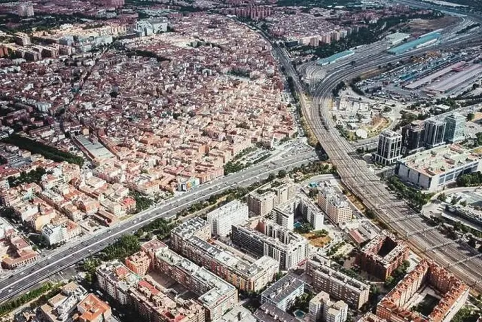 Framed Print : From above aerial drone view shot of city with dense infrastructure in Madrid, Spain Framed Print : From above aerial drone view shot of city with dense infrastructure in Madrid, Spain