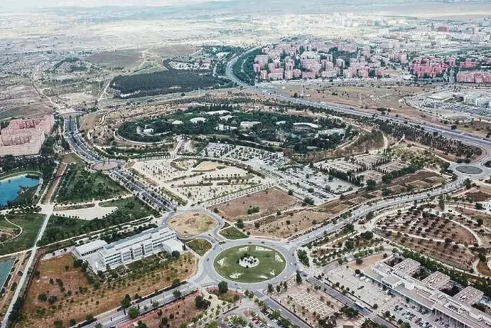 Framed Print : From above aerial drone view shot of city with dense infrastructure in Madrid, Spain Framed Print : From above aerial drone view shot of city with dense infrastructure in Madrid, Spain