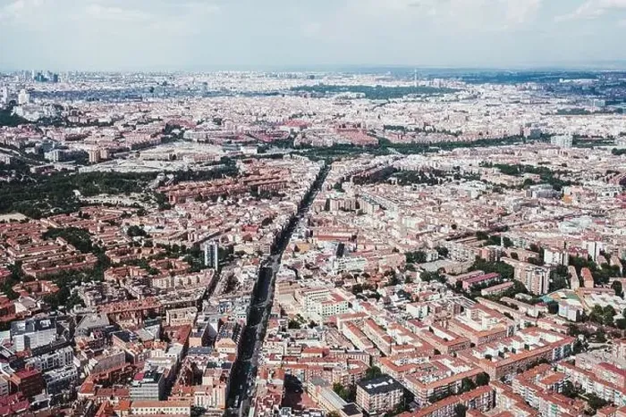 Framed Print : From above aerial drone view shot of city with dense infrastructure in Madrid, Spain Framed Print : From above aerial drone view shot of city with dense infrastructure in Madrid, Spain