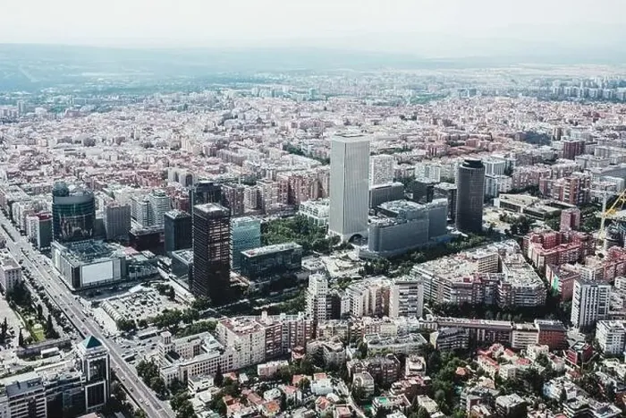 Framed Print : From above aerial drone view shot of city with dense infrastructure in Madrid, Spain Framed Print : From above aerial drone view shot of city with dense infrastructure in Madrid, Spain