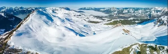 Framed Print : Aerial drone view of snow covered mountains and ski slopes, ski area Stoos, Switzerland Framed Print : Aerial drone view of snow covered mountains and ski slopes, ski area Stoos, Switzerland