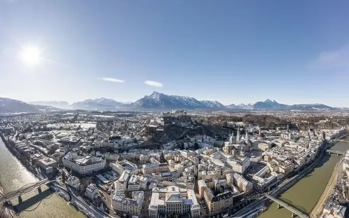 Framed Print : Aerial drone view of snowy Hohensalzburg fortress with view of Unesberg mountain in winter morning
