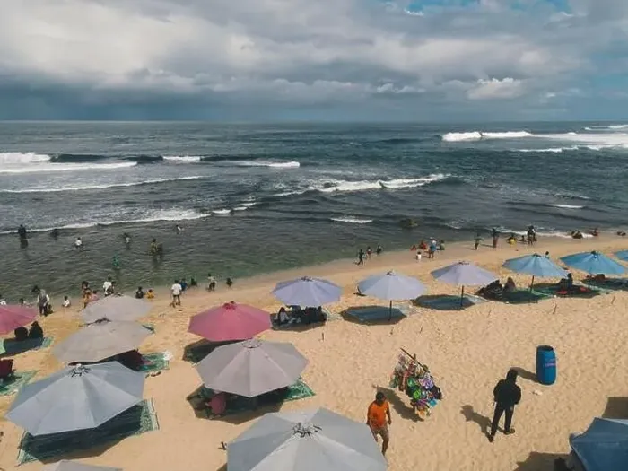Framed Print : Aerial drone view of umbrellas at the beach in Yogyakarta Indonesia Framed Print : Aerial drone view of umbrellas at the beach in Yogyakarta Indonesia