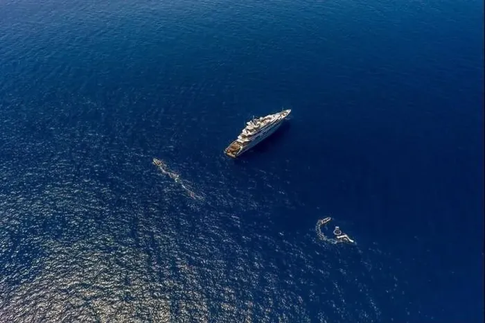 Framed Print : Aerial high-angle drone shot of luxury yacht in Tyrrhenian sea near Capri Island in summer Framed Print : Aerial high-angle drone shot of luxury yacht in Tyrrhenian sea near Capri Island in summer