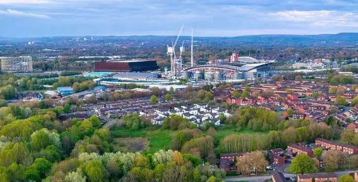 Framed Print : Aerial image of Bradford residential in Manchester showing Edithad Stadium on the distance Framed Print : Aerial image of Bradford residential in Manchester showing Edithad Stadium on the distance