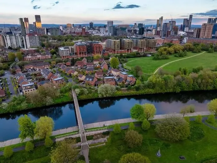Framed Print : Aerial image taken above the river Irwell in Salford showing Manchester and Salford skyline Framed Print : Aerial image taken above the river Irwell in Salford showing Manchester and Salford skyline