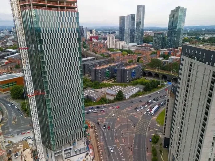 Framed Print : Aerial image of Trinity Islands skyscraper cluster in Manchester UK and Manchester skyline on the background