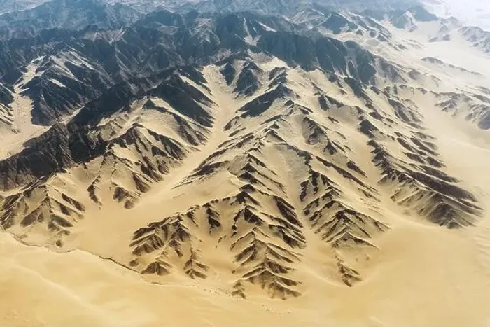 Framed Print : Aerial landscape of the border where the Nazca Desert with Nazca Lines ends and the Andes mountain range begins, Peru Framed Print : Aerial landscape of the border where the Nazca Desert with Nazca Lines ends and the Andes mountain range begins, Peru