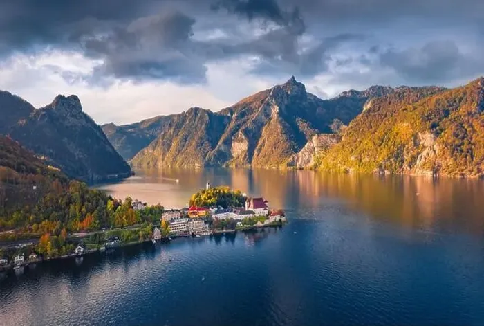 Framed Print : Aerial landscape photography. Dramatic autumn view from flying drone of Traunsee lake Framed Print : Aerial landscape photography. Dramatic autumn view from flying drone of Traunsee lake