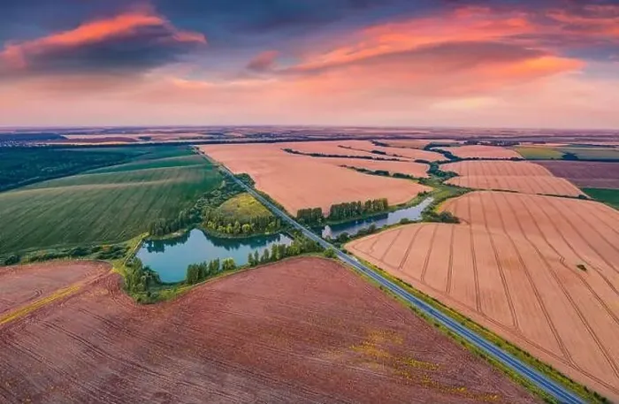 Framed Print : Aerial landscape photography. Spectacular summer sunset on the Ternopil outskirts with two lakes and asphalt road Framed Print : Aerial landscape photography. Spectacular summer sunset on the Ternopil outskirts with two lakes and asphalt road