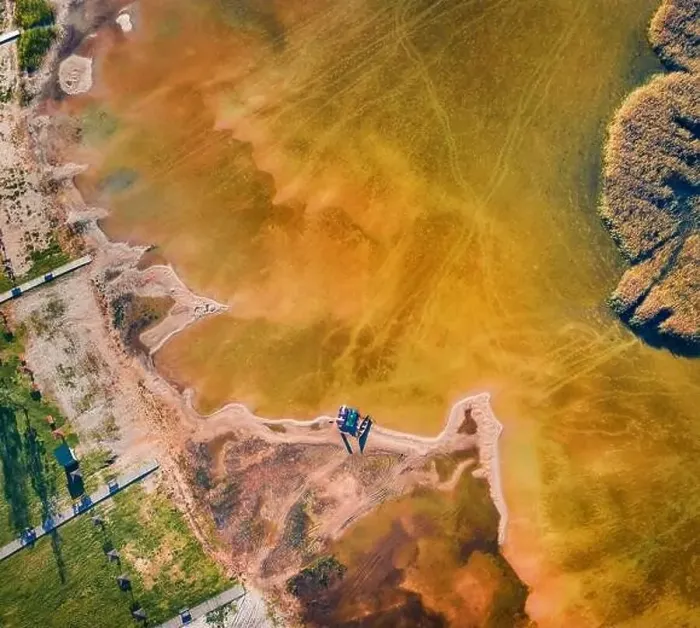 Framed Print : Aerial landscape photography. Straight down view from flying drone of shore and fishing boats on Svityaz lake Framed Print : Aerial landscape photography. Straight down view from flying drone of shore and fishing boats on Svityaz lake