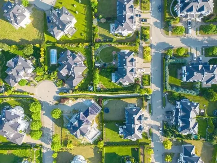 Framed Print : Aerial of new construction luxury residential neighborhood street single family homes real estate Framed Print : Aerial of new construction luxury residential neighborhood street single family homes real estate