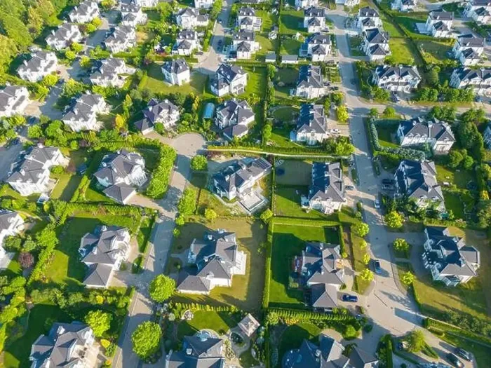 Framed Print : Aerial of new construction luxury residential neighborhood street single family homes real estate Framed Print : Aerial of new construction luxury residential neighborhood street single family homes real estate