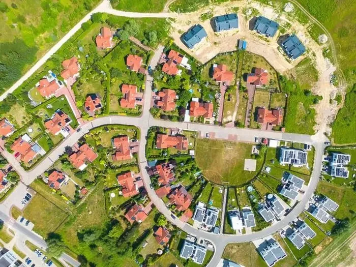 Framed Print : Aerial of new construction luxury residential neighborhood street single family homes real estate Framed Print : Aerial of new construction luxury residential neighborhood street single family homes real estate