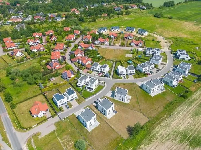 Framed Print : Aerial of new construction luxury residential neighborhood street single family homes real estate Framed Print : Aerial of new construction luxury residential neighborhood street single family homes real estate