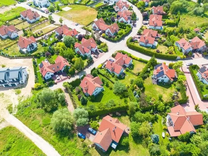 Framed Print : Aerial of new construction luxury residential neighborhood street single family homes real estate Framed Print : Aerial of new construction luxury residential neighborhood street single family homes real estate
