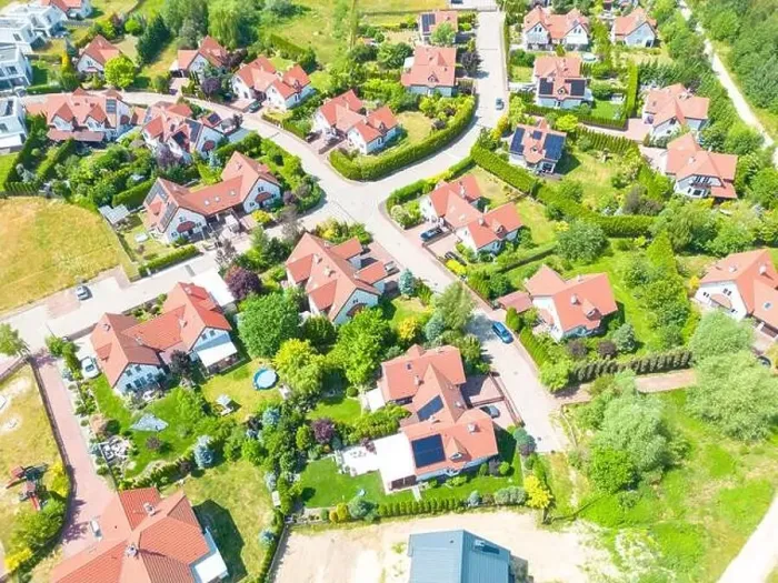 Framed Print : Aerial of new construction luxury residential neighborhood street single family homes real estate Framed Print : Aerial of new construction luxury residential neighborhood street single family homes real estate