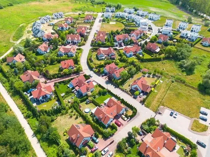 Framed Print : Aerial of new construction luxury residential neighborhood street single family homes real estate Framed Print : Aerial of new construction luxury residential neighborhood street single family homes real estate