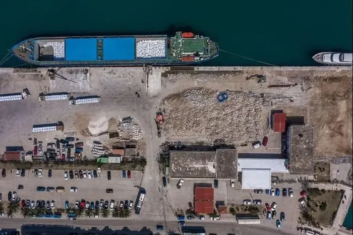 Framed Print : Aerial overhead drone shot of cargo ship in Argostolion town harbour on Kefalonia Island Framed Print : Aerial overhead drone shot of cargo ship in Argostolion town harbour on Kefalonia Island