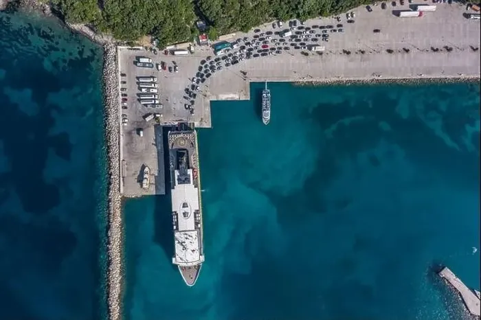 Framed Print : Aerial overhead drone shot of cars embarking on big cruise ship at Poros town harbour of Kefalonia Island Framed Print : Aerial overhead drone shot of cars embarking on big cruise ship at Poros town harbour of Kefalonia Island