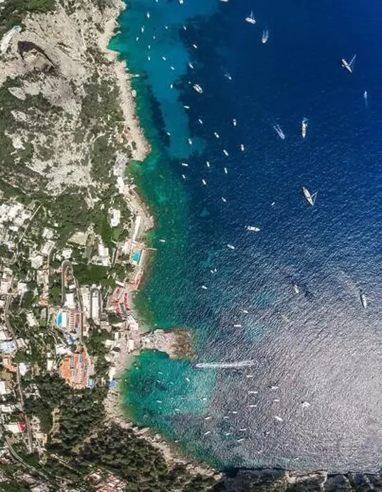Framed Print : Aerial overhead drone shot of southern Capri Island coastline with yachts in summer noon Framed Print : Aerial overhead drone shot of southern Capri Island coastline with yachts in summer noon