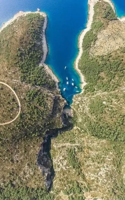 Framed Print : Aerial overhead drone shot of Stiniva covert cove beach in Adriatic sea on Vis Island in Croatia in summer Framed Print : Aerial overhead drone shot of Stiniva covert cove beach in Adriatic sea on Vis Island in Croatia in summer