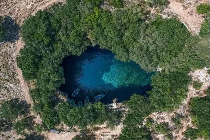 Framed Print : Aerial overhead drone shot of tourists boat in subterranean Melissani Lake Cave in Kefalonia Island Framed Print : Aerial overhead drone shot of tourists boat in subterranean Melissani Lake Cave in Kefalonia Island