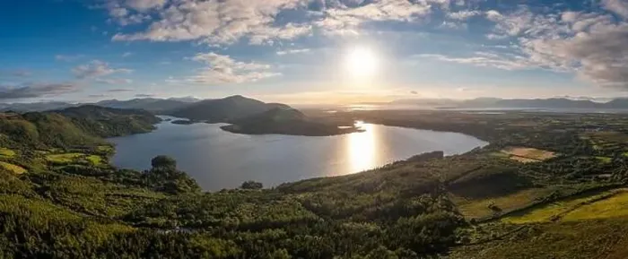 Framed Print : An aerial panorama of Caragh Lake in County Kerry with the sun setting over the lake Framed Print : An aerial panorama of Caragh Lake in County Kerry with the sun setting over the lake
