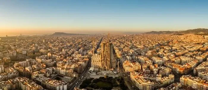 Framed Print : Aerial panorama drone shot of Barcelona city center in sunrise golden hour in Spain winter