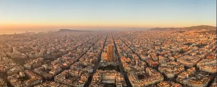 Framed Print : Aerial panorama drone shot of Barcelona city church in construction in sunrise hour in Spain winter Framed Print : Aerial panorama drone shot of Barcelona city church in construction in sunrise hour in Spain winter