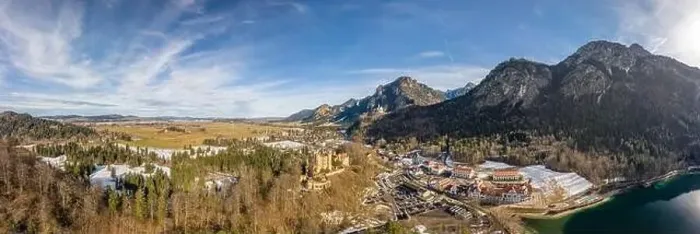 Framed Print : Aerial panorama drone shot of Hohenschwangau in Fussen with view of Neuschwanstein castle by lake in Germany winter Framed Print : Aerial panorama drone shot of Hohenschwangau in Fussen with view of Neuschwanstein castle by lake in Germany winter
